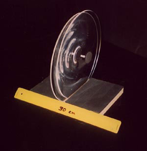 Plastic lenses used to mimic the gravitational field.